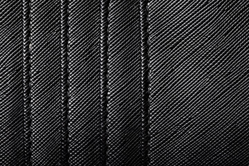 Black artificial leather pattern. Woman handbag closeup macro texture.
