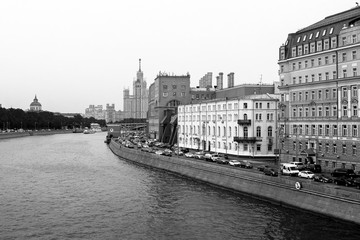 Stalin skyscraper on the background of the river. Moscow River view of the Stalinist skyscraper. black and white photography