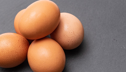  raw eggs on a natural background