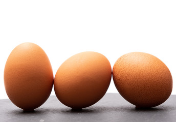  raw eggs on a natural background