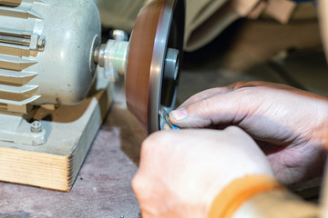 Sharpening broken drills on a diamond wheel