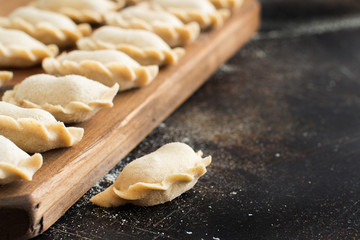 Raw meat pelmeni, ravioli, dumplings