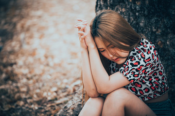 Beautiful thai woman very sad from unrequited love,rethink,think over,vintage style,dark tone,broken heart,asian girl