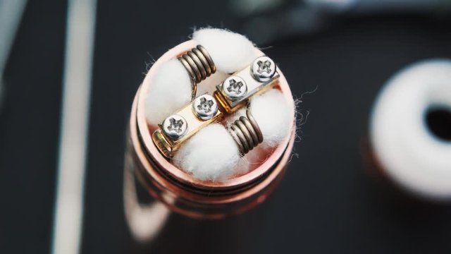 Repair,maintenance vaping device mod.Upgrade parts for modern vaporizer e-cig device,spare parts.Micro coil clearomizer.Quit smoking nicotine cigarette,start vaping safe ecig vape