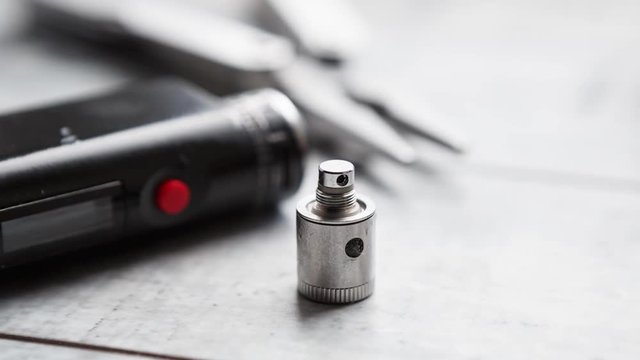 Repair,maintenance vaping device mod.Upgrade parts for modern vaporizer e-cig device,spare parts.Micro coil clearomizer.Quit smoking nicotine cigarette,start vaping safe ecig vape