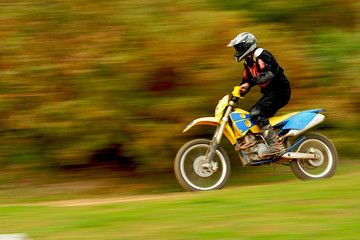 Motocross Action in Autumn