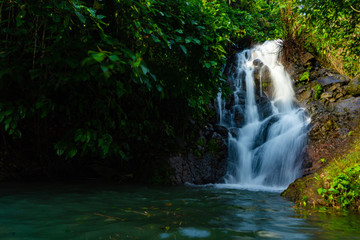 Fototapeta premium Landscape of natural waterfall in Khun Dan Prakarnchon Dam at Nakhon Nayok, Thailand