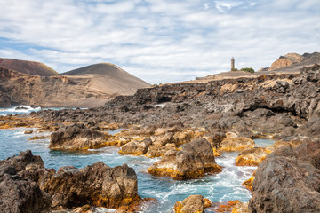 Fototapeta na wymiar Capelinhos volcano and lighthouse, Azores