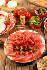 ham, salami, sausage with cheese and baguette