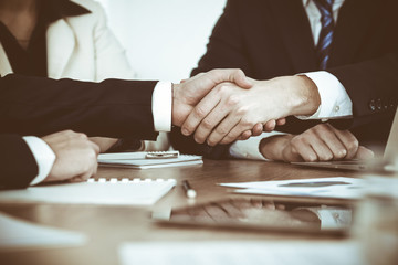 Business people shaking hands at meeting or negotiation in the office. Handshake concept. Partners are satisfied because signing contract
