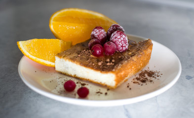 orange and berry pie on a plate