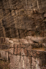 Stone wall surface, natural colors gray and brown. Abstract background