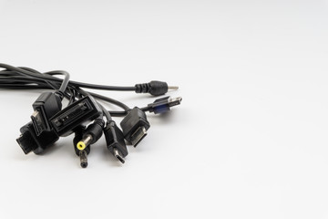 Universal recharger head isolated on white background. Selective focus and crop fragment