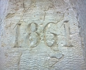 1861, one thousand eight hundred and sixty-one, building date in Mantua, Corso Garibaldi 32, date engraved on the wall of the building.