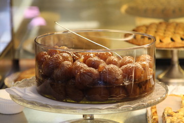 Marron glacé in a pastry shop window