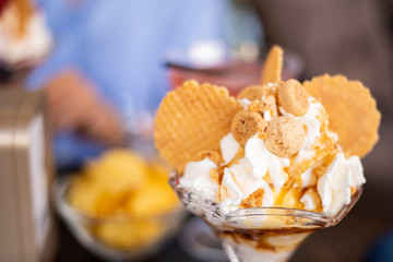 very good ice cream cup with little biscuits