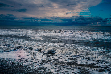 blue sea and cloudy sky waves