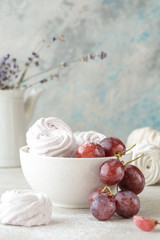 Homemade zephyr and mint on an old wooden table covered 