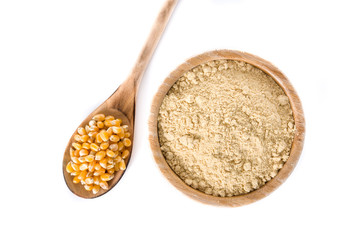 Corn flour in bowl isolated on white background. Top view