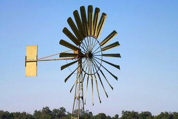 View of small windmill or wind turbine. Wind power concept