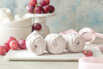 Homemade zephyr and mint on an old wooden table covered 