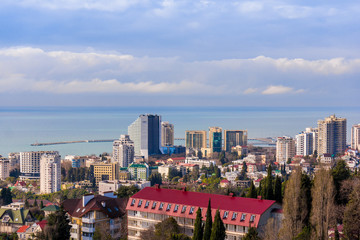 Sochi, Russia - 30 January, 2016 - Top view of the  city of Sochi with  modern houses and the sea