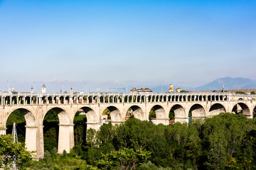 Fototapeta na wymiar characteristic Road and railway bridge, Cuneo in Piedmont