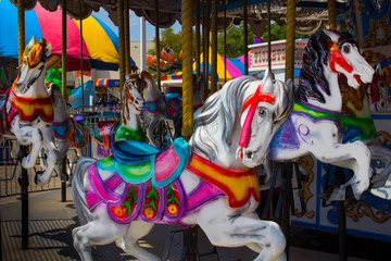 Fototapeta na wymiar Carnival merry-go-round carousel horse