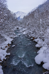 Mineral spring in falls in the river Baksan