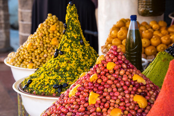 Selection of pickled olives on a traditional Moroccan market (souk) in Medina of Essaouira, Morocco