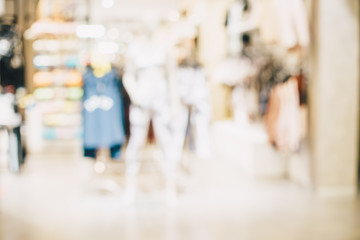 Blurred group of people shopping in supermarket