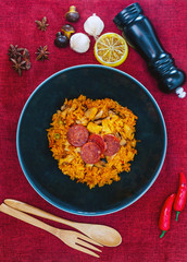 Paella with chicken, seafood and chorizo