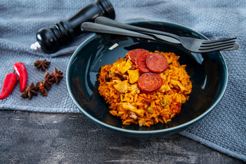 Paella with chicken, seafood and chorizo