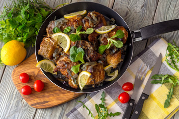 The fried cod fish with onions