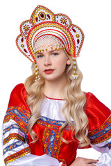 Traditional Russian folk costume, portrait of a young beautiful girl