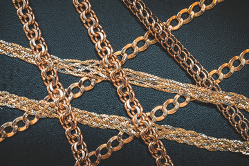 Gold chain for fashionable prints on a dark background, the trend of the 80s, 90s