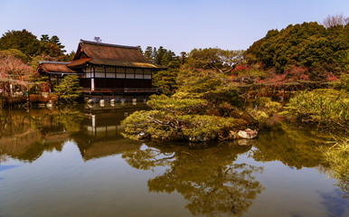Fototapeta na wymiar Amazing landscape of Japanise garden over the lake in the Heian Shrine in Kyoto, Japan.