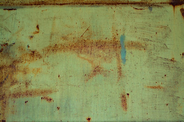 Texture of old metal surface with cracked paint and rust