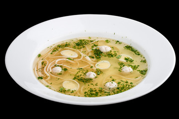 Chicken broth with meatballs and quail egg