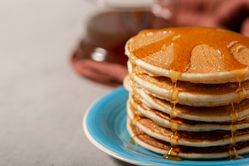 Pancakes Close Up, Delicious breakfast of pancakes with honey and sugar powder, close up view