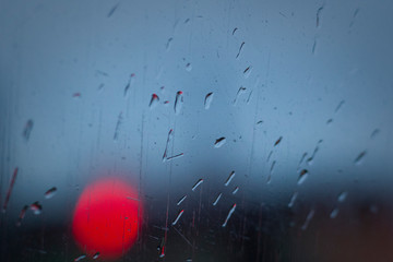 Rain drops on the glass, background