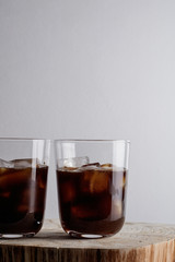 Ice coffee on a wood table.