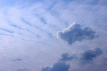 Naklejka na ściany i meble Beautiful Sky Background. Dramatic Sky, Copy Space For Text. Clouds On A Blue Sky.