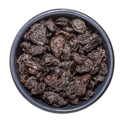 raisins in a bowl isolated on white background