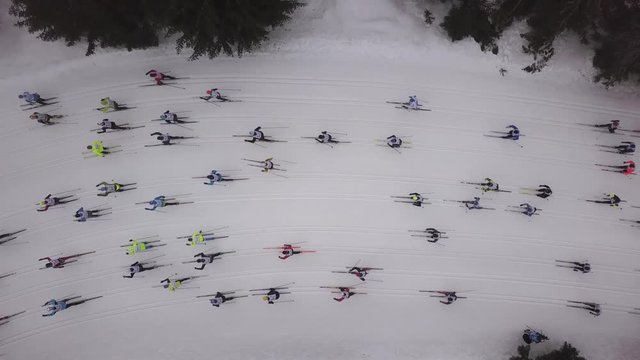 Cross country Ski Race, athlete does cross country skiing along snowy track, Aerial 4K video of Jizera mountains