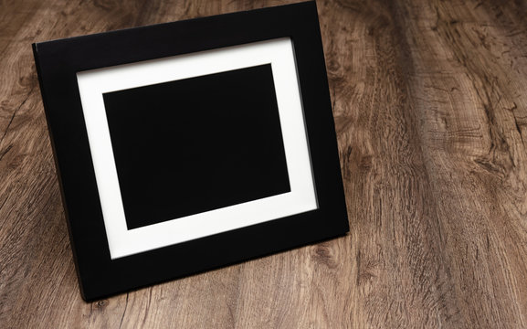 empty wooden photo frame