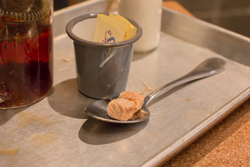 brown sugar cube on spoon