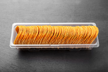 chips in a box on the table