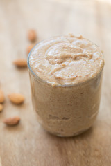 a glass of almond butter