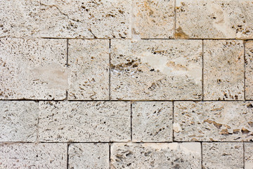 Texture of rough sandstone brick wall